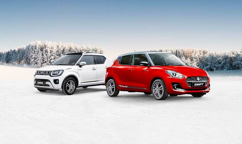 null Weisser Suzuki Ignis und roter Suzuki Swift