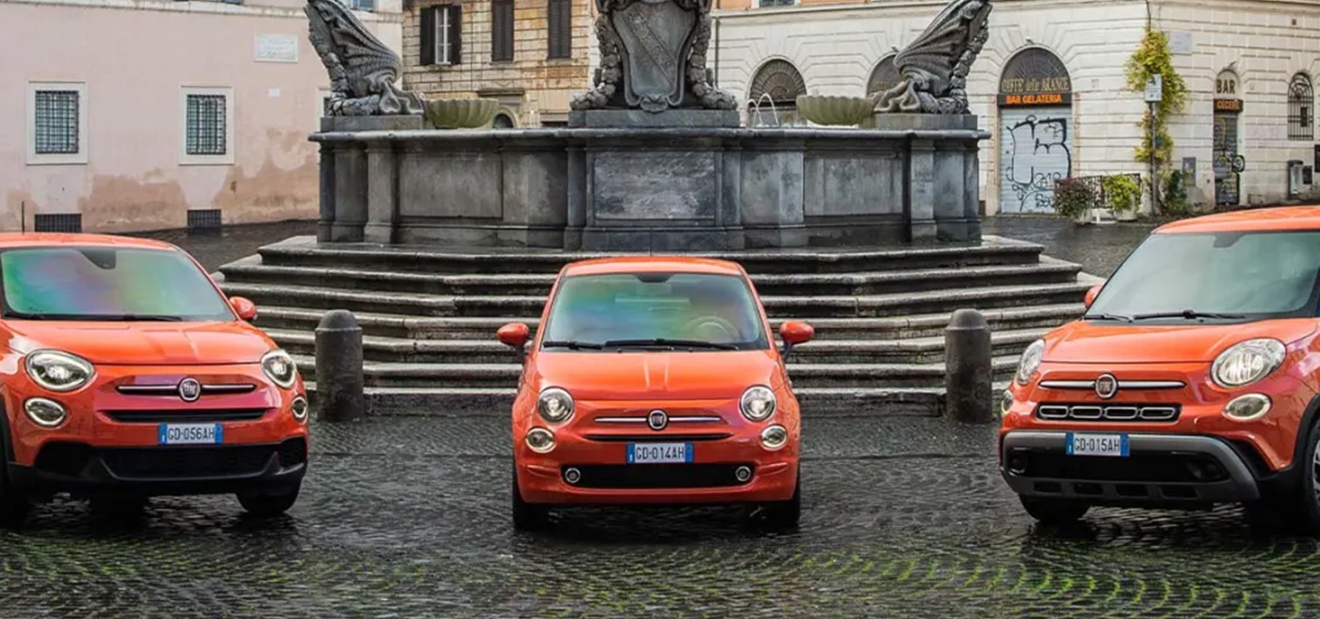 Drei orange Fiat